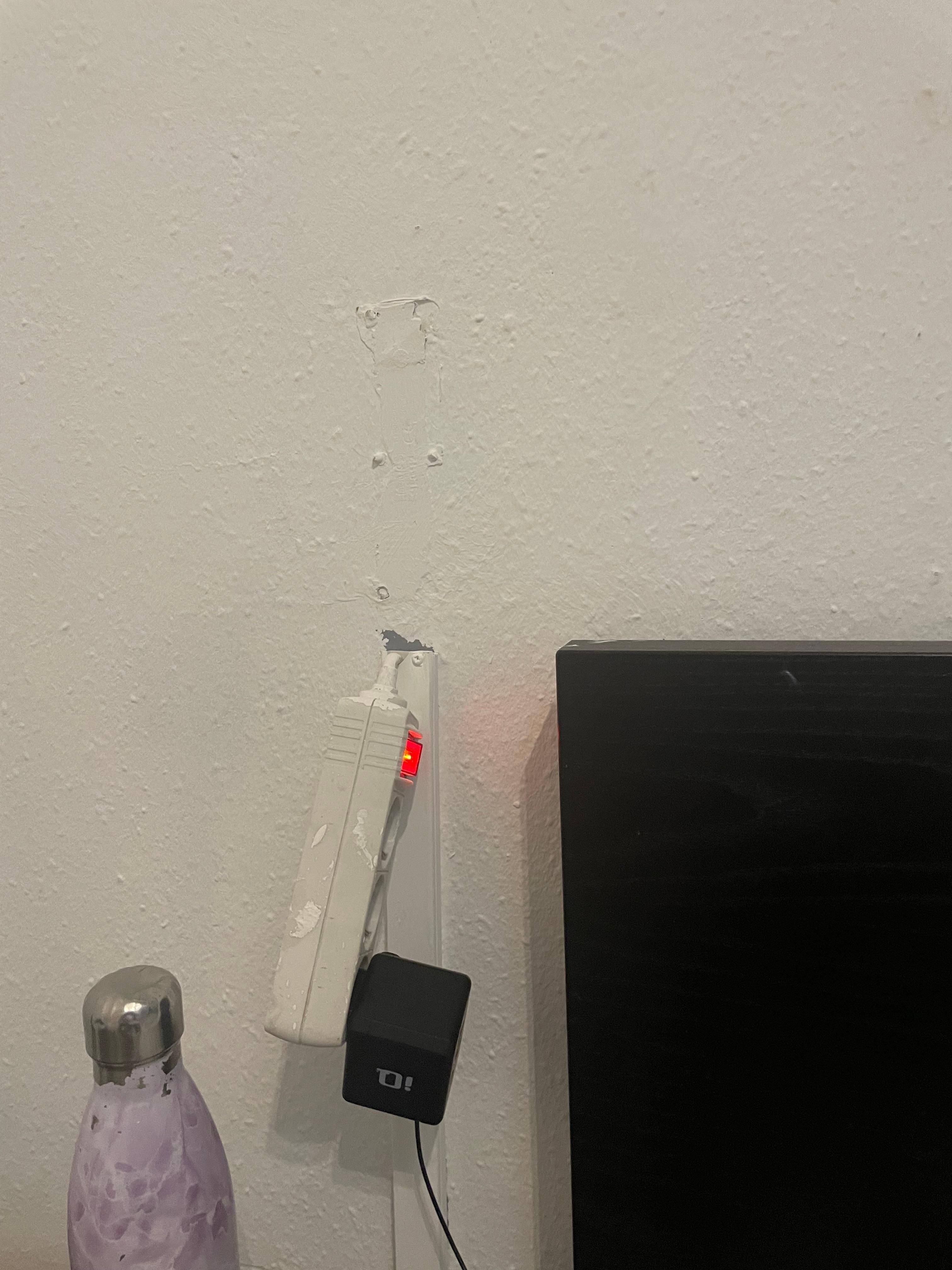 Power bar fallinf off wall