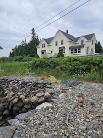 The front of the VRBO from the inlet across the street
