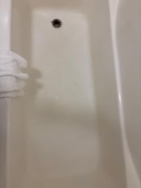 Bathtub in room