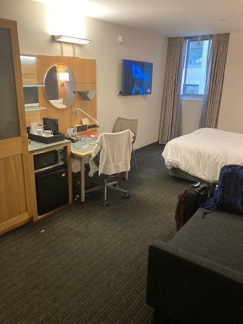 The room was average. Do not open the window otherwise it smells bad. The views were unappealing. 