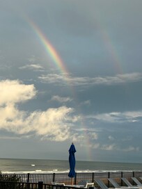 This is a photo from standing by the pool area, looking onto the beach.