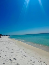 Beach access white sand and clear blue water