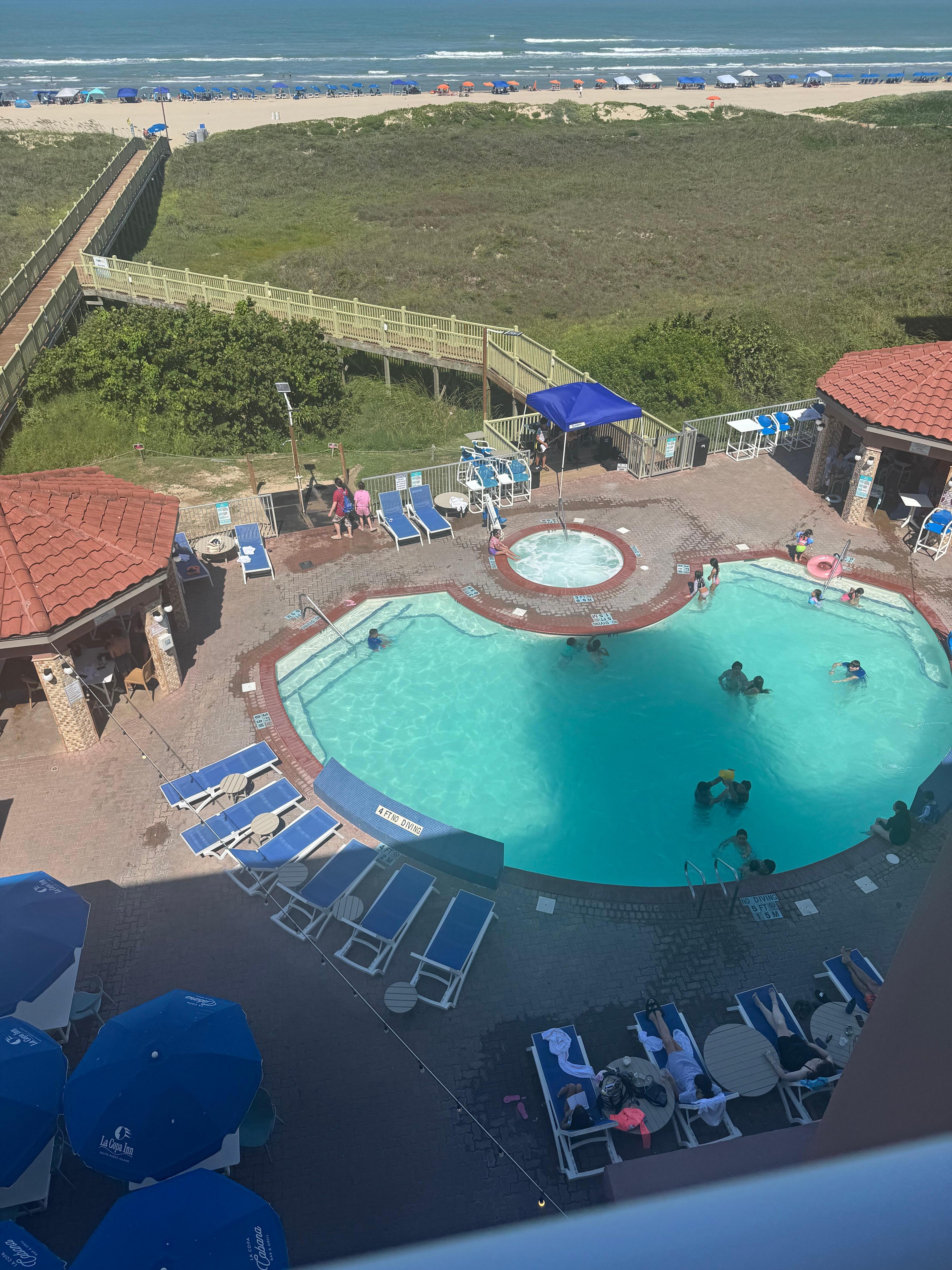 The pool, boardwalk and beach. 