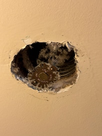 Filthy sprinkler system head on ceiling