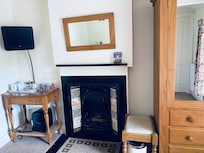 Antique fireplace in our room