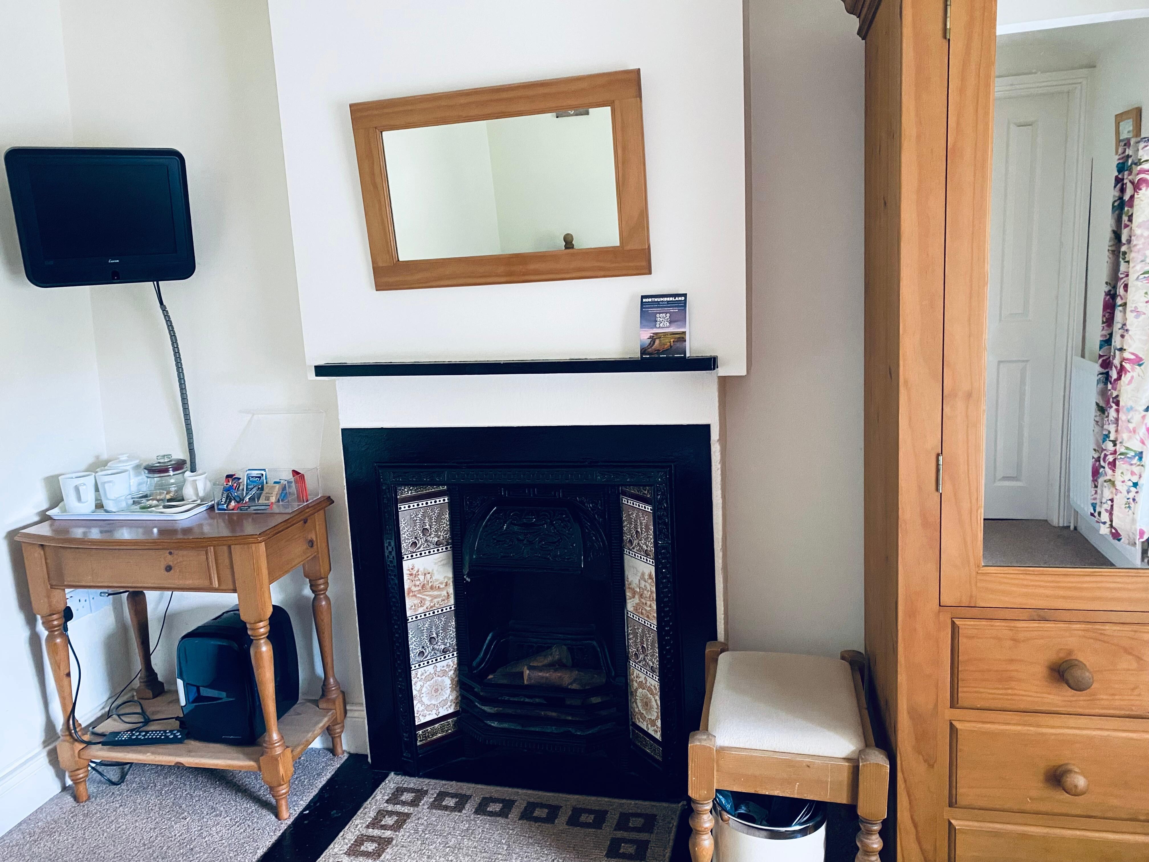 Antique fireplace in our room