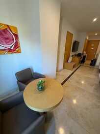 Small table with very moldy plant that made the room smell musty