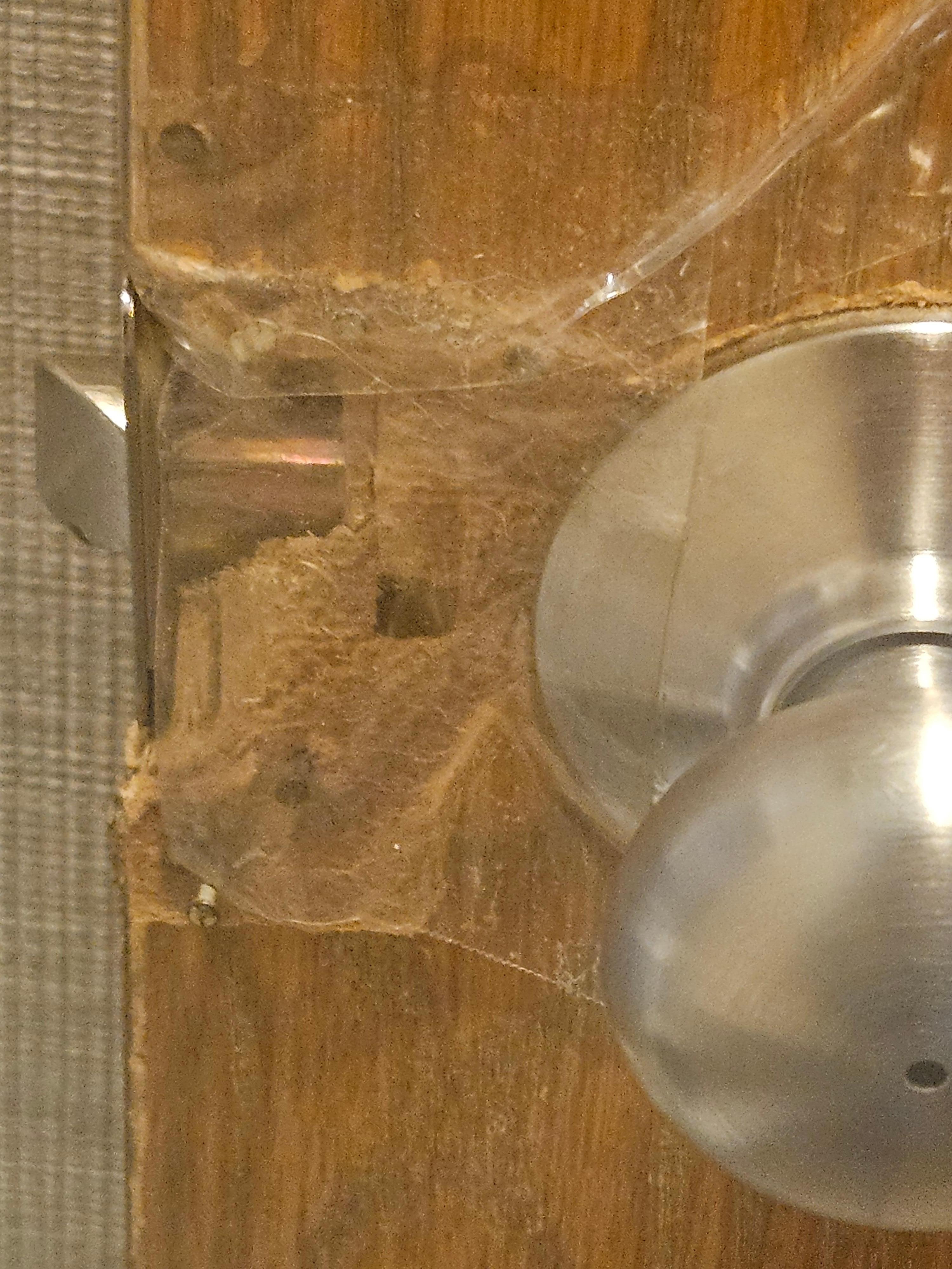 Busted door panel taped up.