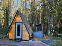 Cabin, hot tub and outhouse. The pictures don't do it justice. It's beautiful.