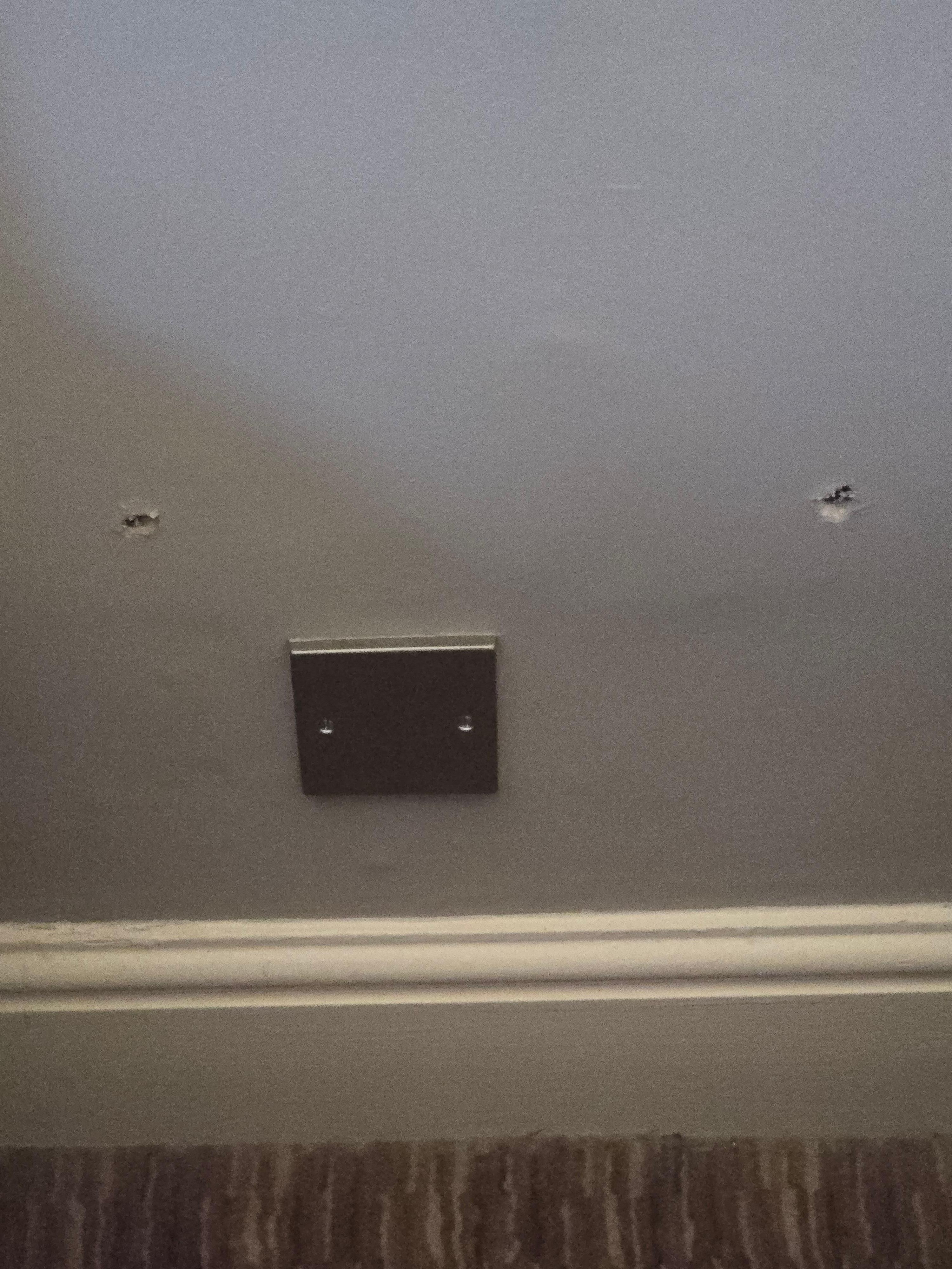 Holes in wall 1
