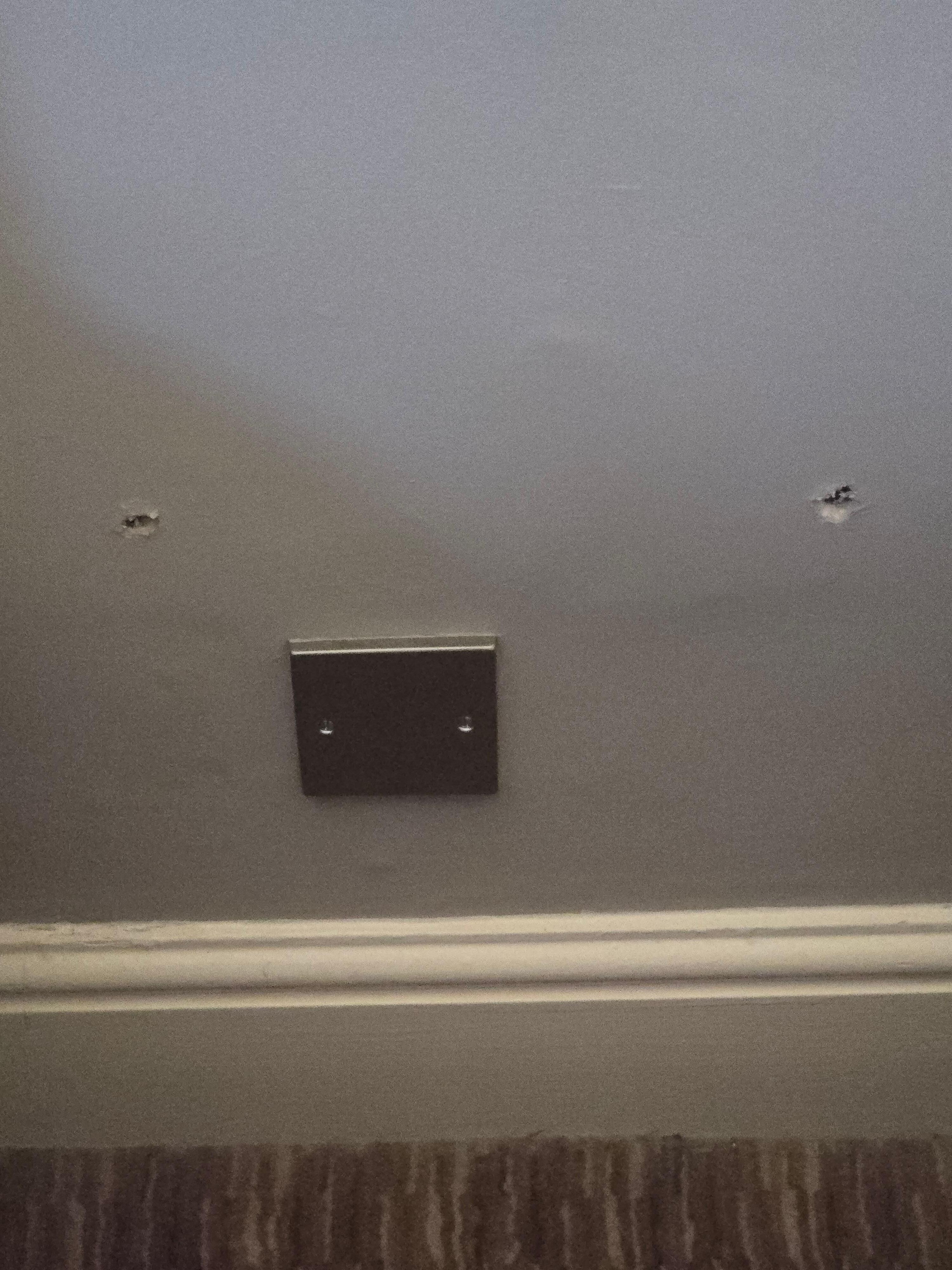 Holes in wall 1