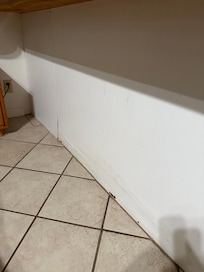 Cracking on the walls in kitchen.