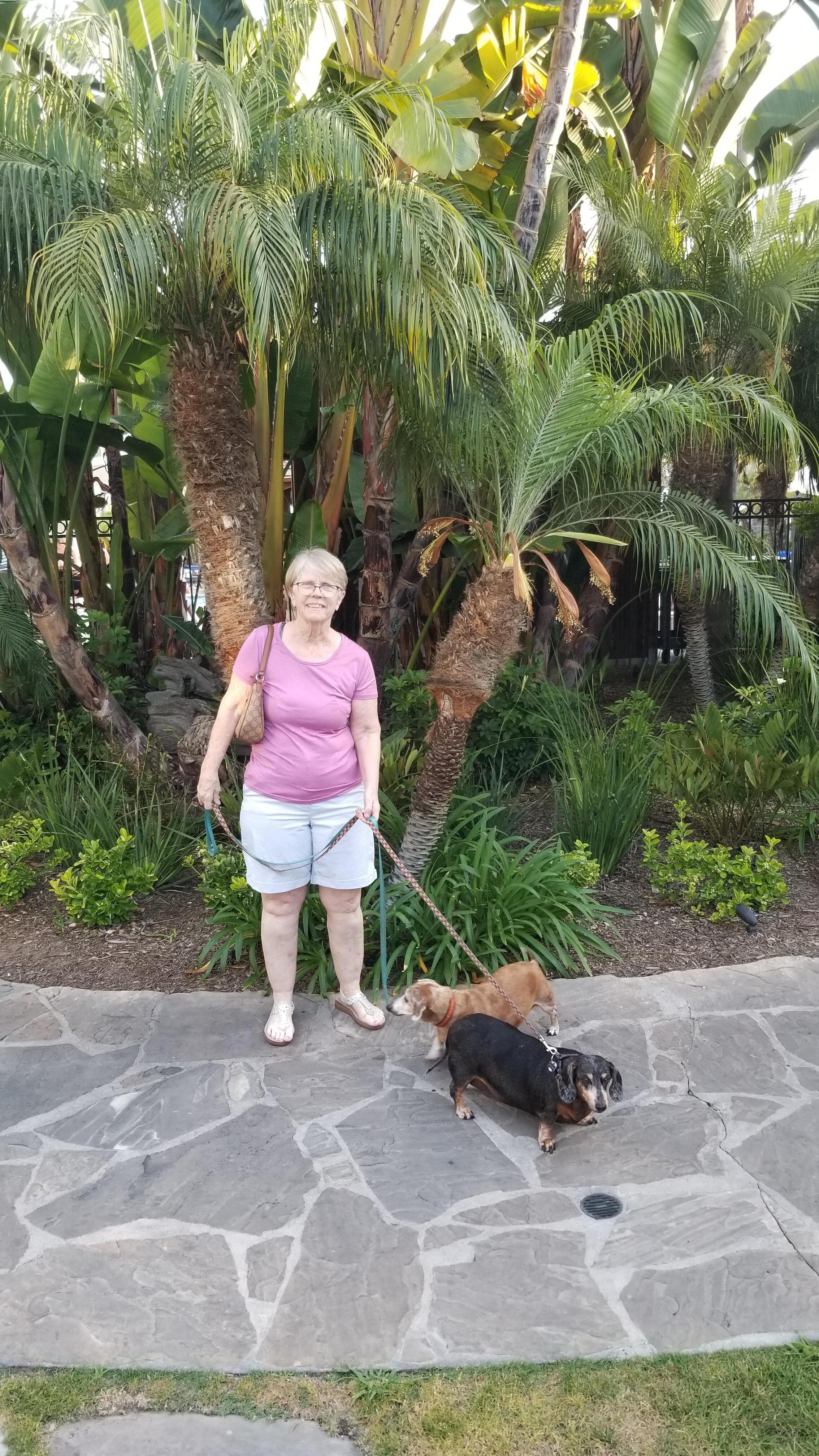 Mom with Mulo & Murphy by our hotel room. Fwlt like Hawaii. Beautiful plants and grounds