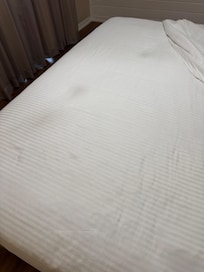 Stained bedding. Notified property who sent housekeeping - who remade my bed with the stained linens.