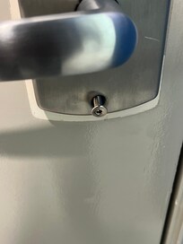 Screws to the door were undone