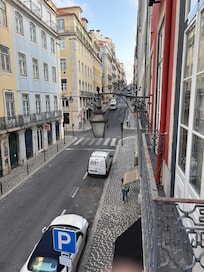 The hotel is the red building