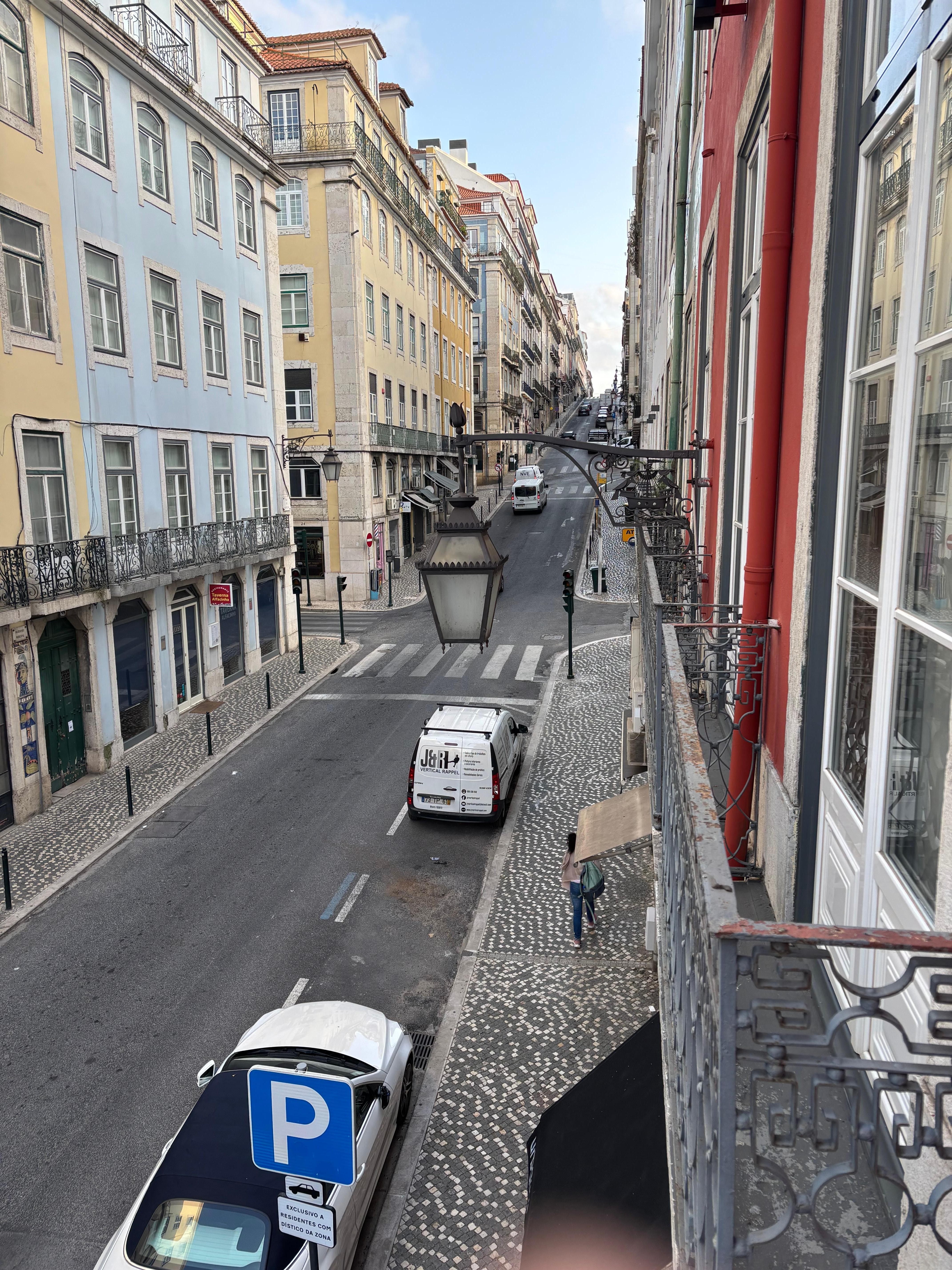 The hotel is the red building