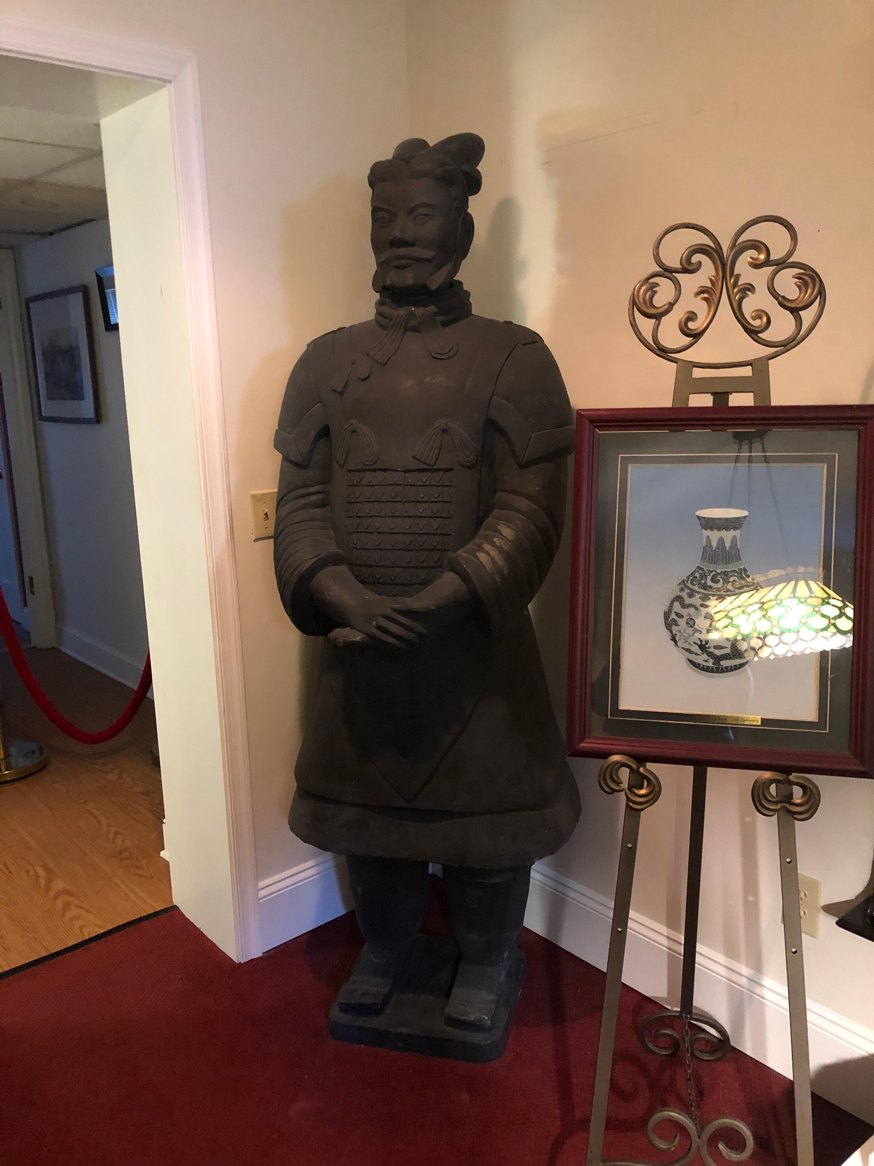 The owner’s terra cotta soldier statue from China