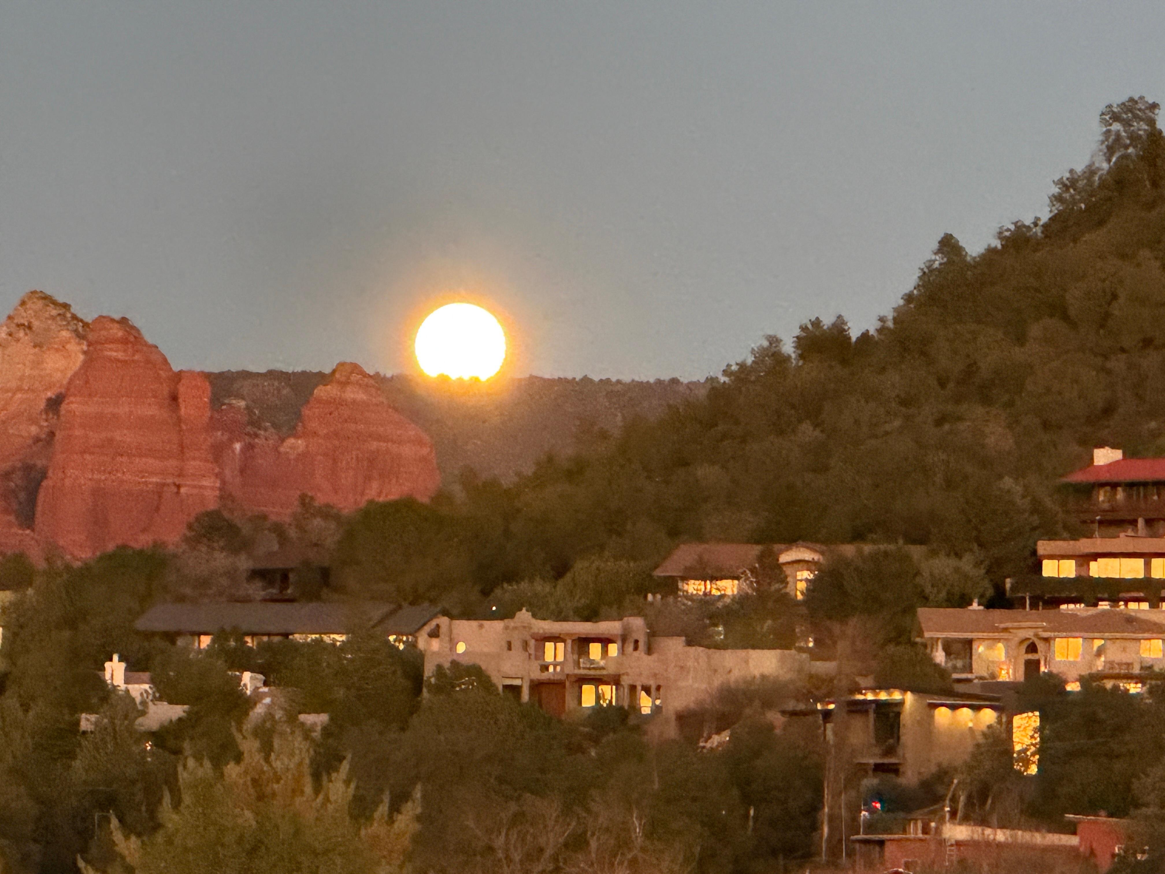 View from the main deck of a full moon setting early in the morning