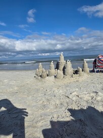 My husband enjoyed building a sandcastle on the beach