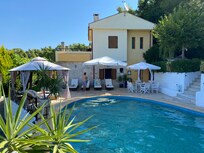 The pool and house