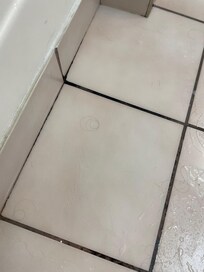 Upon arrival. Still had hair throughout and shower would leak into the floor from between tiles after every use. Was not overspray.