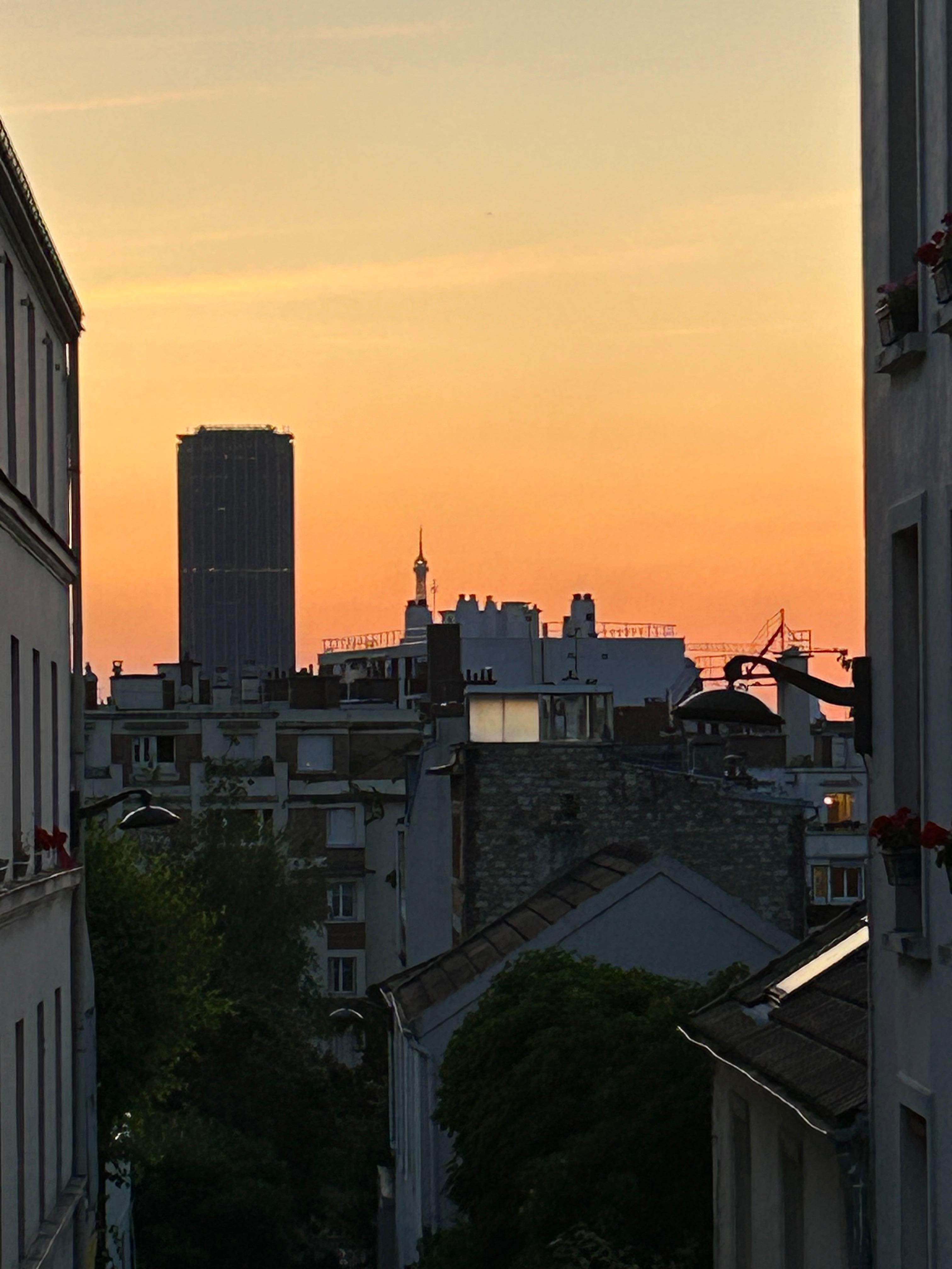 Evening view from loft. Top of Eiffel Tower can be seen.