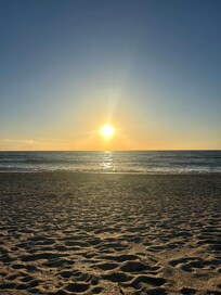 Sunset, the place’s beachfront.