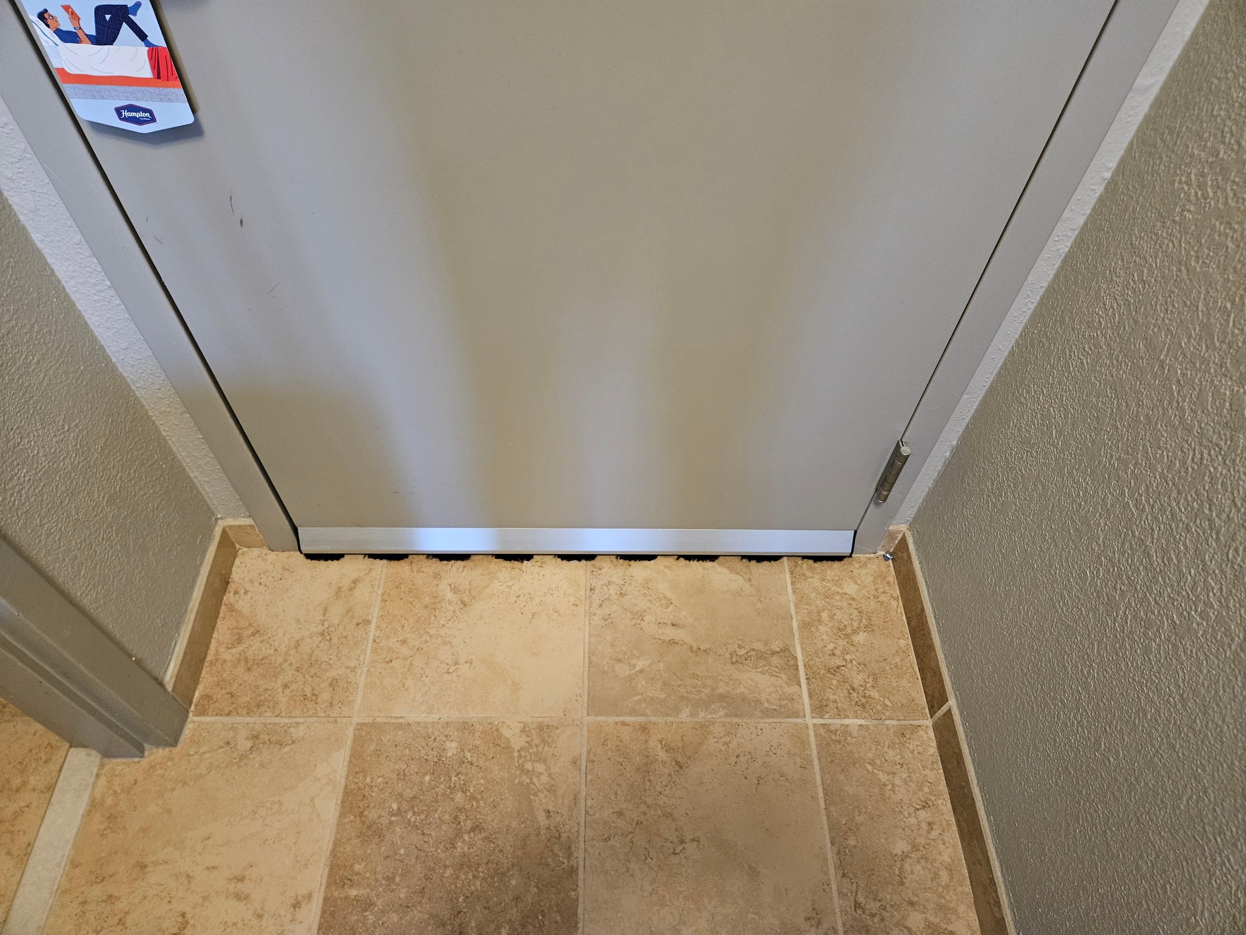Door: no gap at the bottom; no noise sneak-in from the hallway