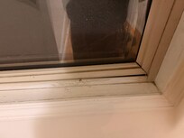 Window that would not close or lock. It was like this when we arrived.