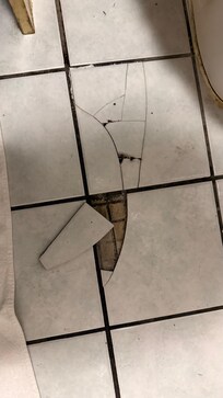 Broken popped out tile