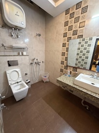 Water splashes all over, bathroom floor gets wet, dirty and smells bad.