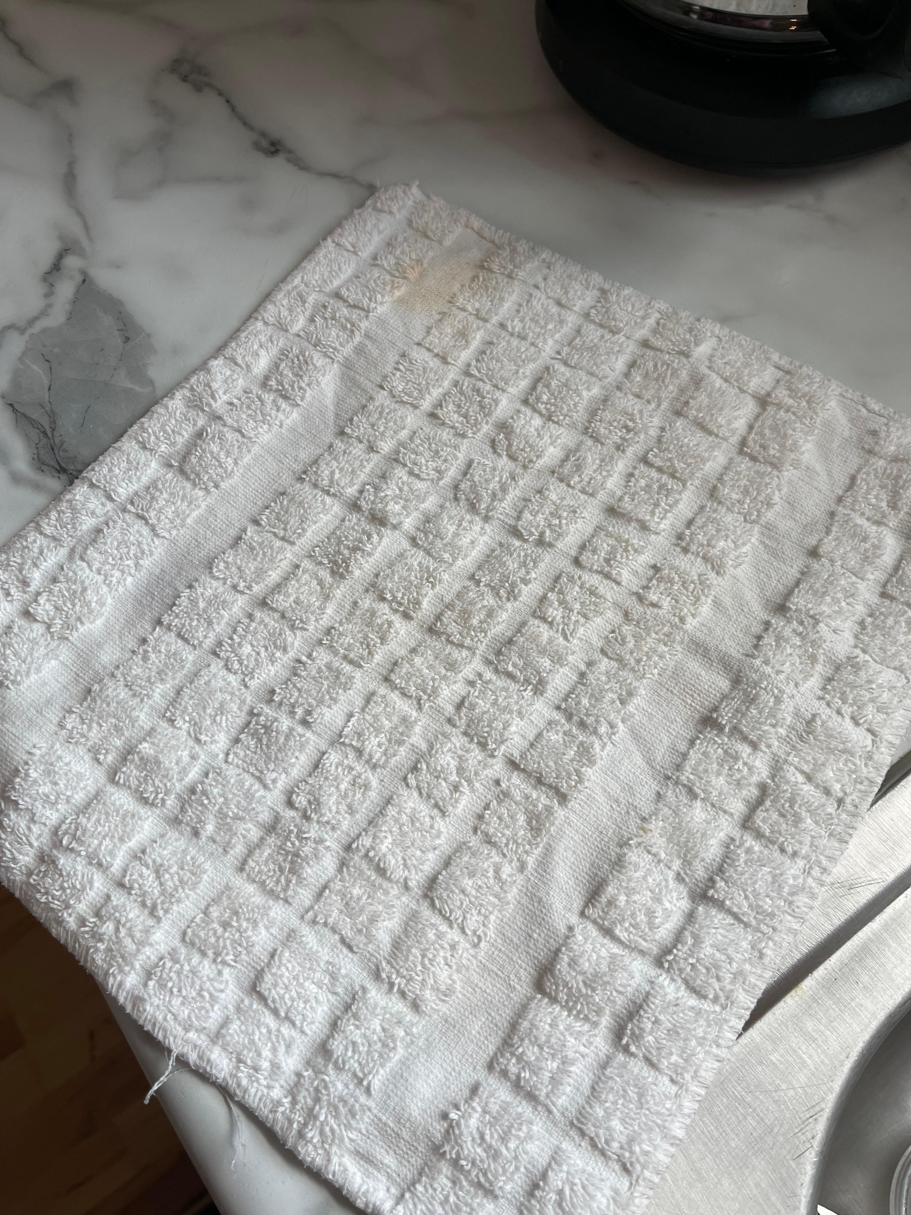 Dingy stained dish towel