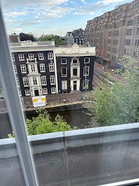 Room view, 4 th floor. The blue awnings across the street…excellent food!