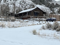 The cabin from the driveway