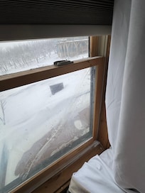 Multiple broken windows were taped together