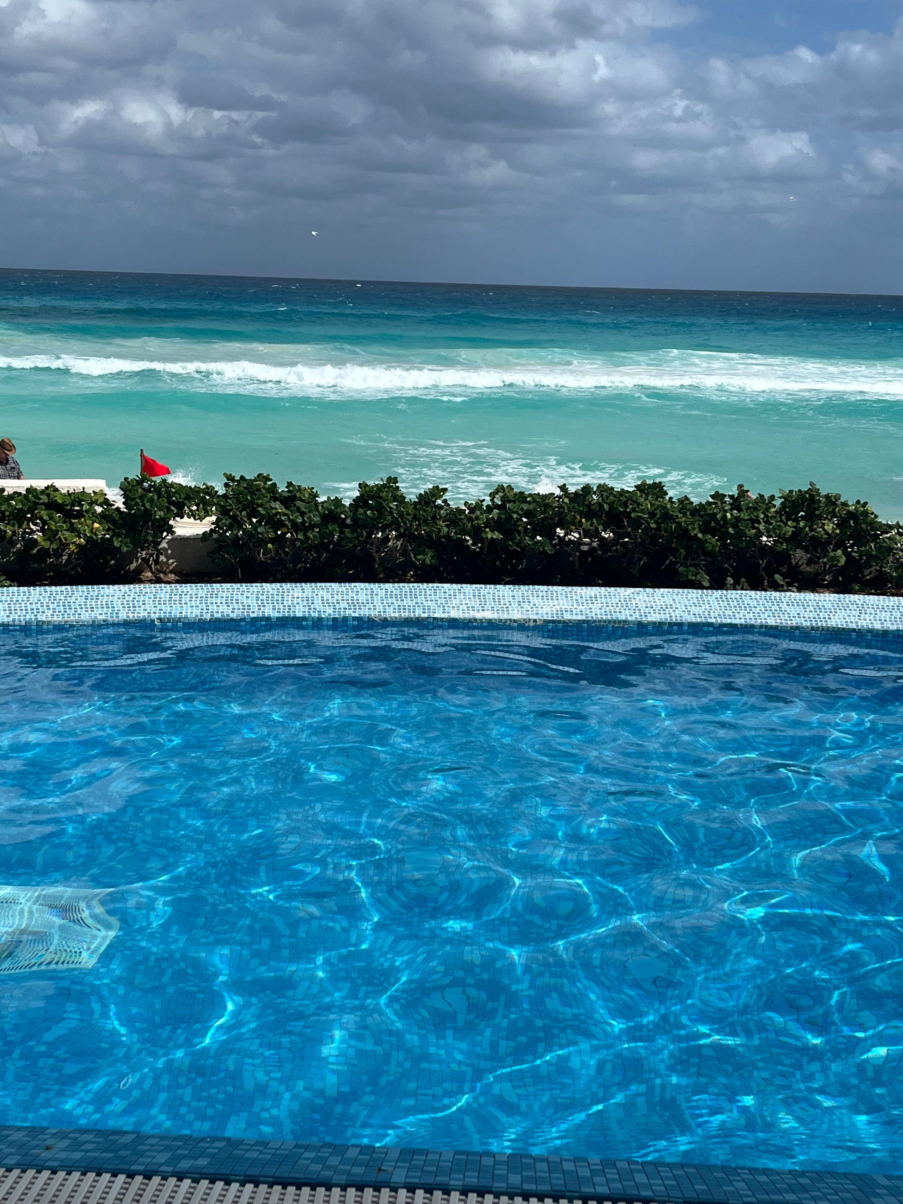 Pool with beach behind