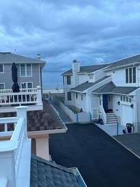 View of the beach from upstairs balcony