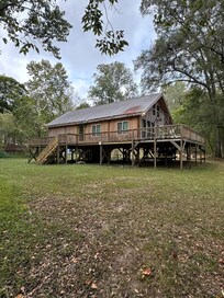 The back side of the house. Note, this is the side of the house with the keyed door.
