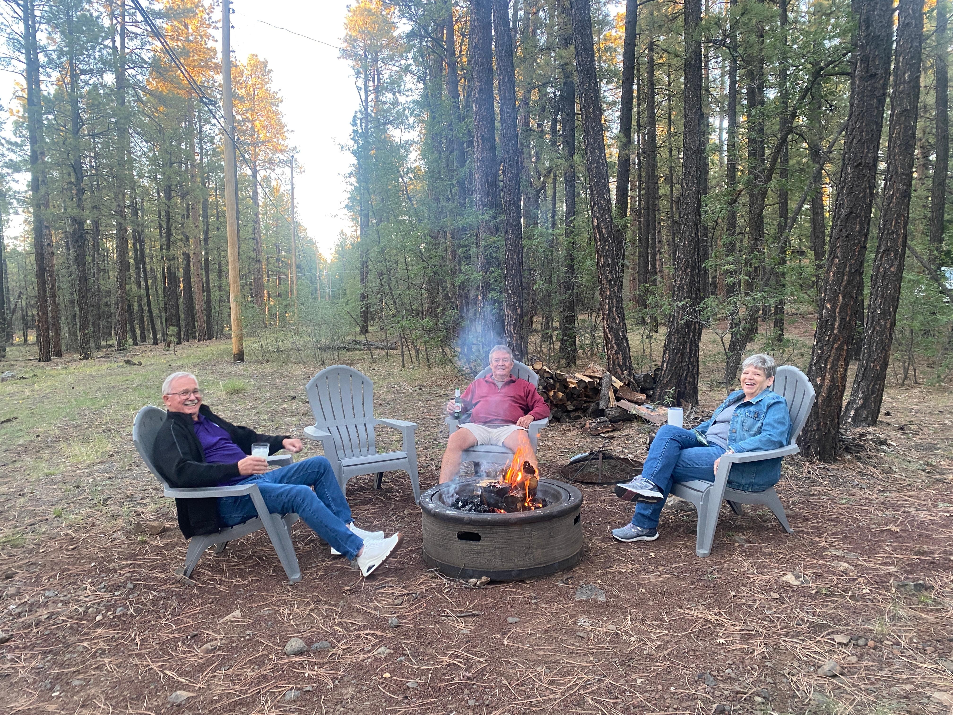 A great fire pit in the backyard with ample stock of wood.  Beautiful scenery