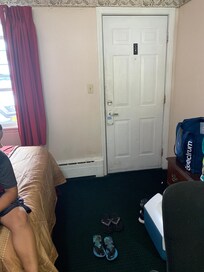 Filthy wall and door.