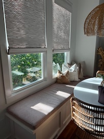 Tons of natural light throughout the house! Unique touches like a bench seat!