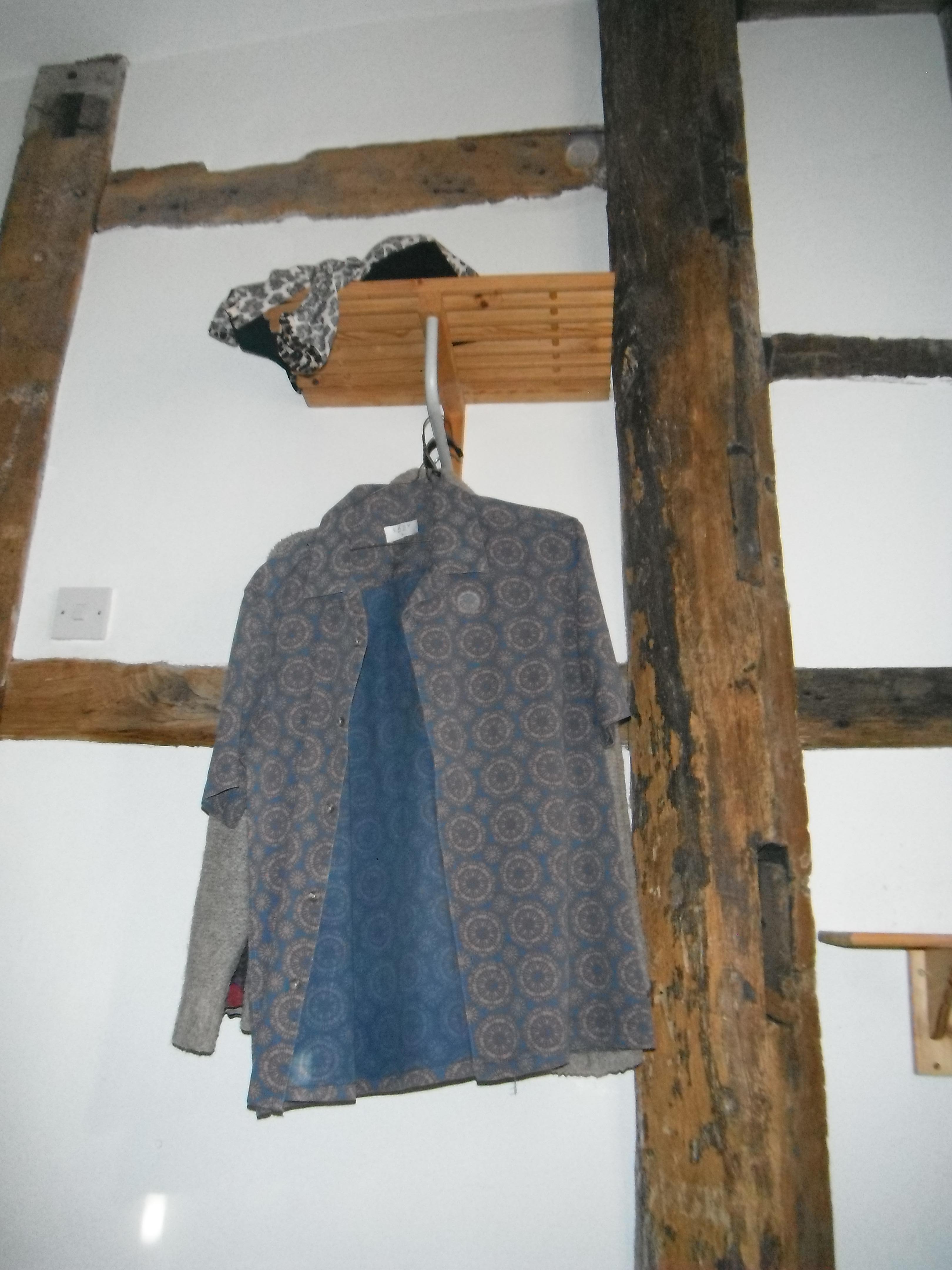 Rail for hanging clothes, only in one of the rooms booked