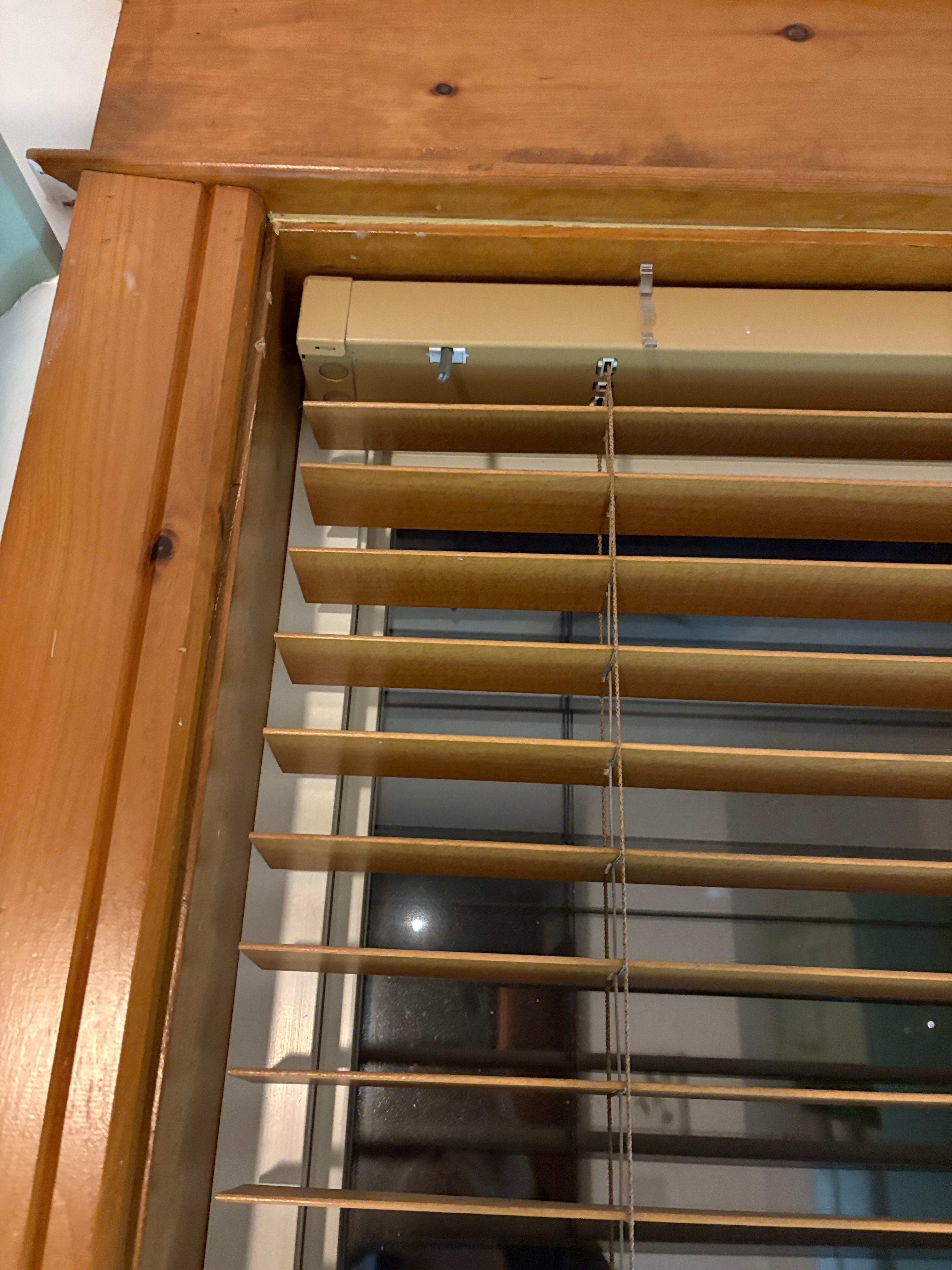 Several blinds not properly functioning. 