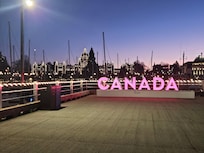 View of BC legislature from across Victoria Harbour.