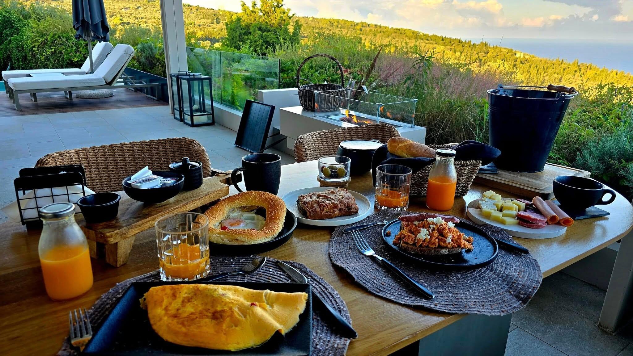 Breakfast on our deck with a view! You will not go hungry, that's for sure!