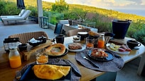 Breakfast on our deck with a view! You will not go hungry, that's for sure!