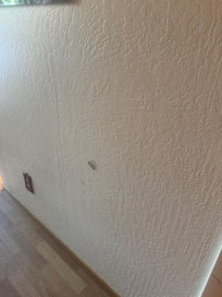 Walls chipped, in need of repair.