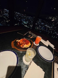 Drinks and okonomiyaki from the restaurant at the top.