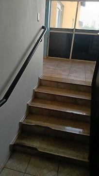 Escada de acesso aos quartos